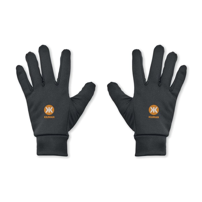 Guantes negros de Kiliman con logo naranja, diseñados para protección y comodidad.