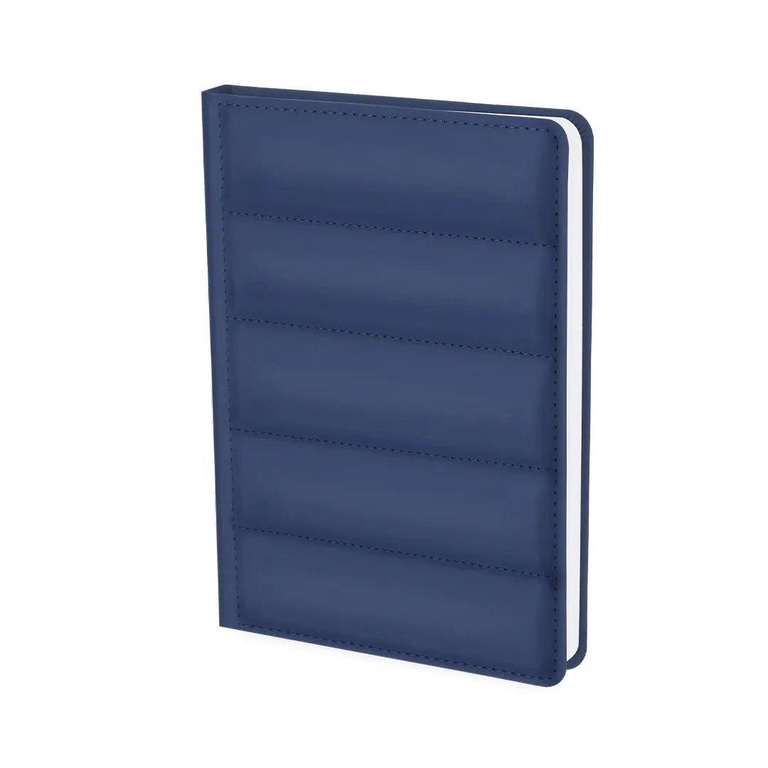 Cuaderno azul marino con cubierta acolchada de piel sintética cerrada
